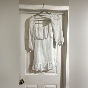 Speechless, white polkadot dress